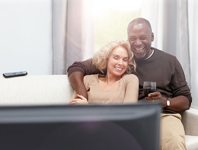 Couple watching cable tv