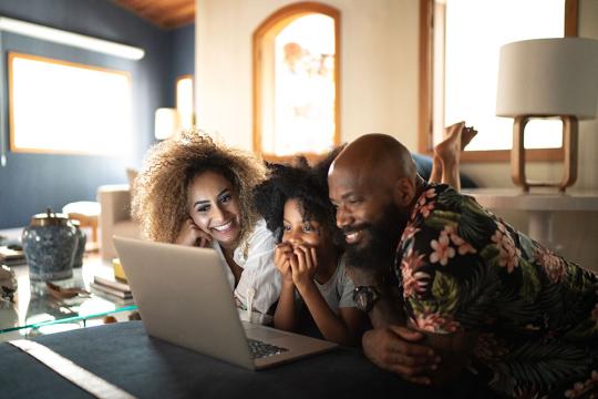 People watching video on laptop