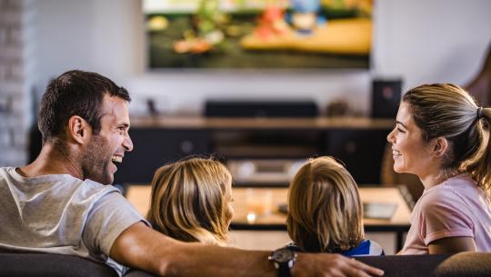 Family watching tv