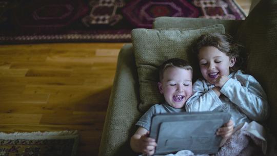 Children watching videos on tablets