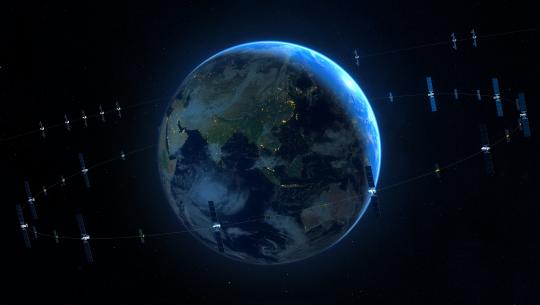 Picture of earth from space, surrounded by orbiting satellites.