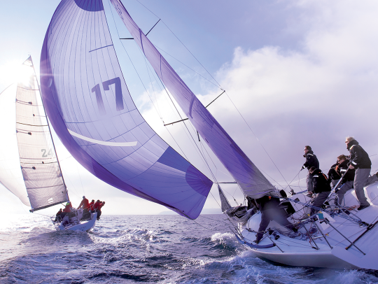 An image of two sailboats on the water.