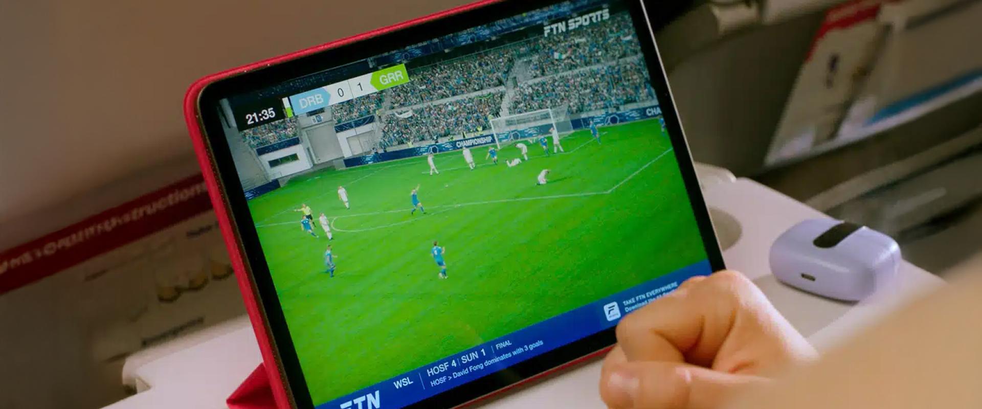 Image of an iPad showing live sports.