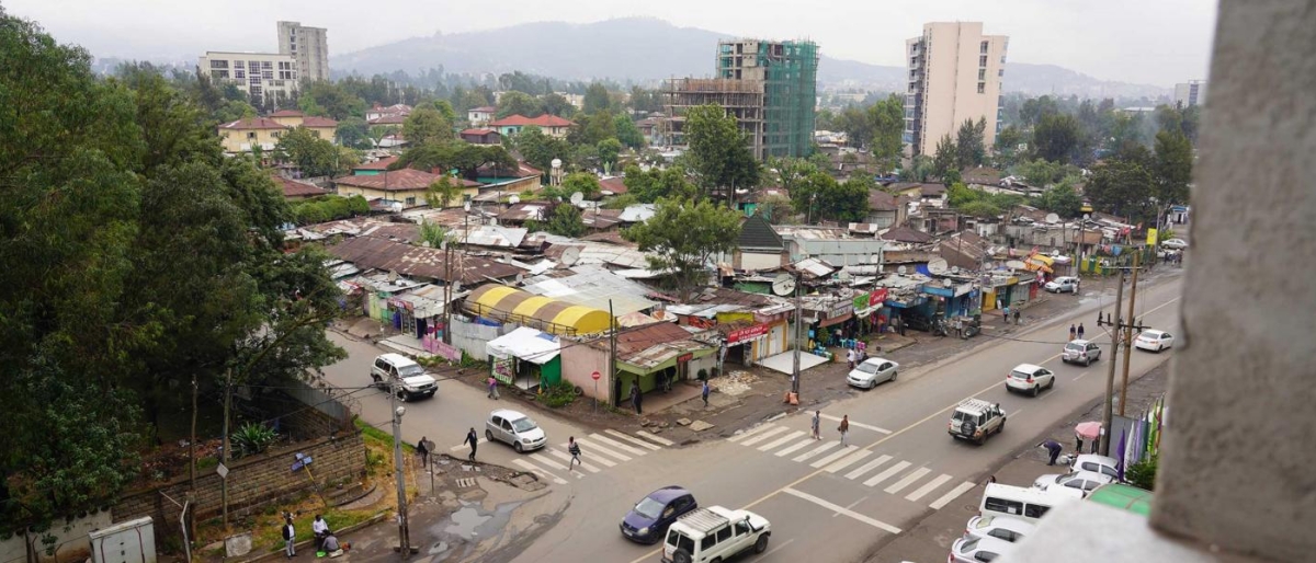 Image of urban neighborhood with busy streets taken from a to angle.