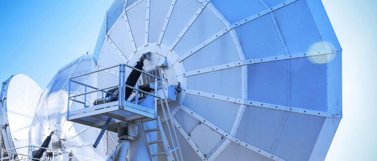 Closeup image of large satellite antennas.