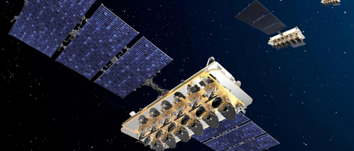 Image of O3b satellites with large solar arrays orbiting in space.