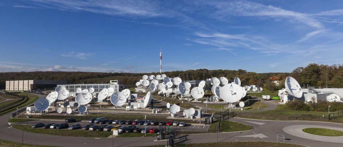 Wide angle image of satellites mounted behind a car parking.