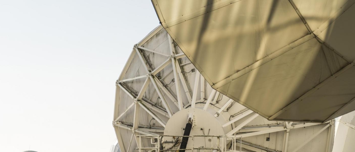 Closeup image of large satellite communication antennas.