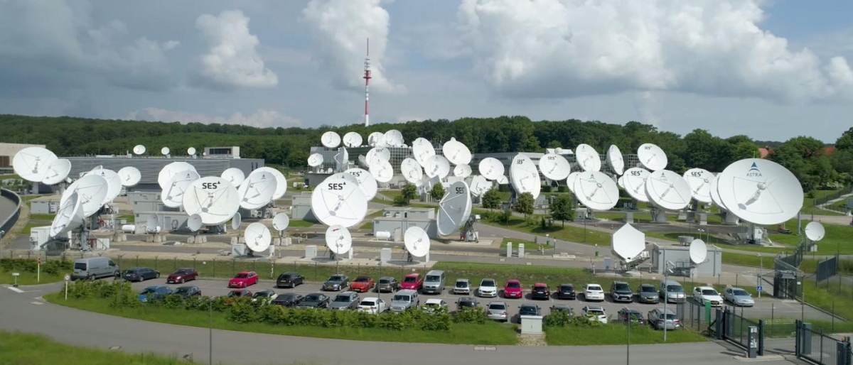 Image of SES and Astra satellite dishes at a communications facility.