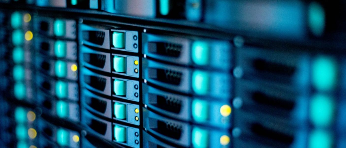 Close-up image of server hardware with illuminated indicator lights.