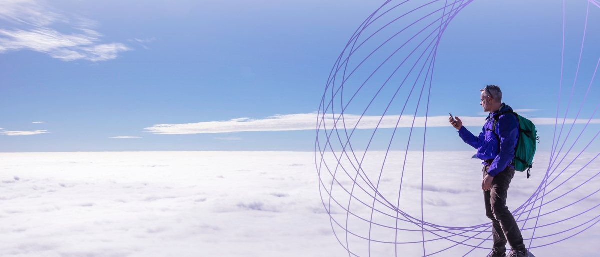 hiker using cell service