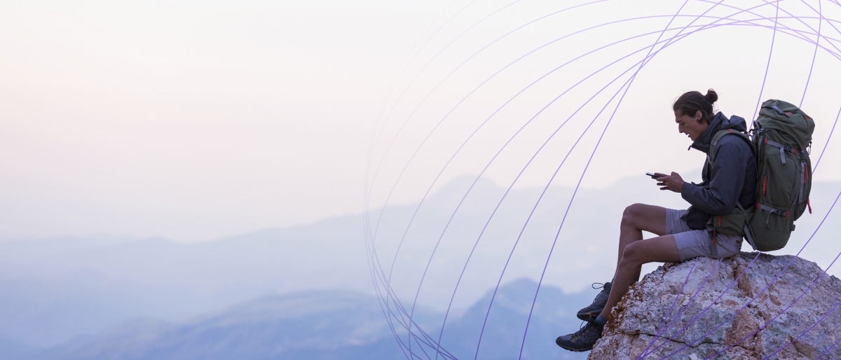 hiker using cell service
