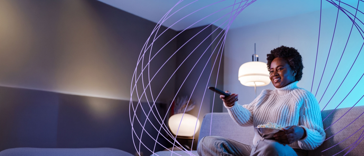 woman with tv remote control