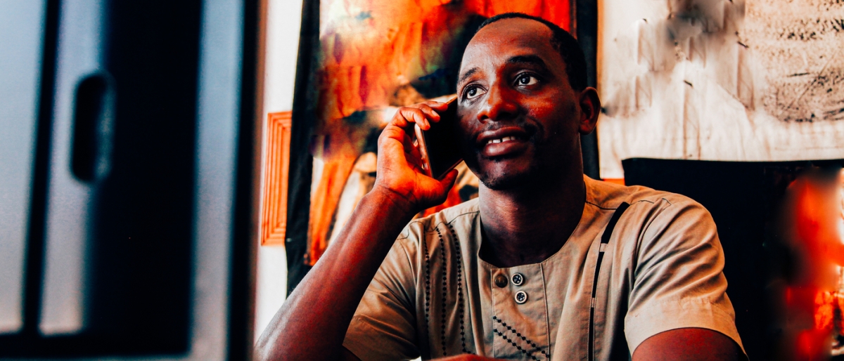 man in Mali using cellphone