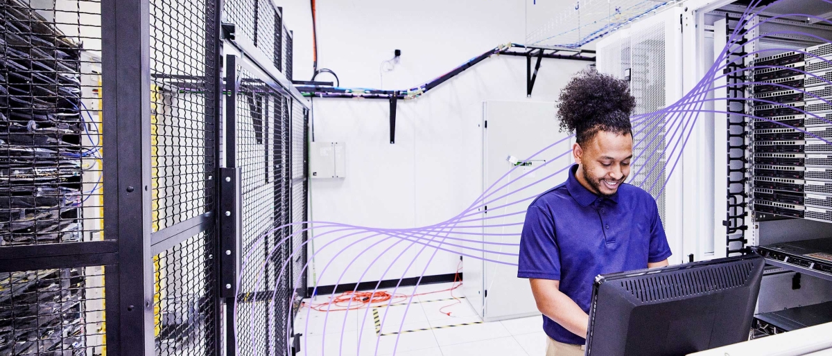 man working in server room