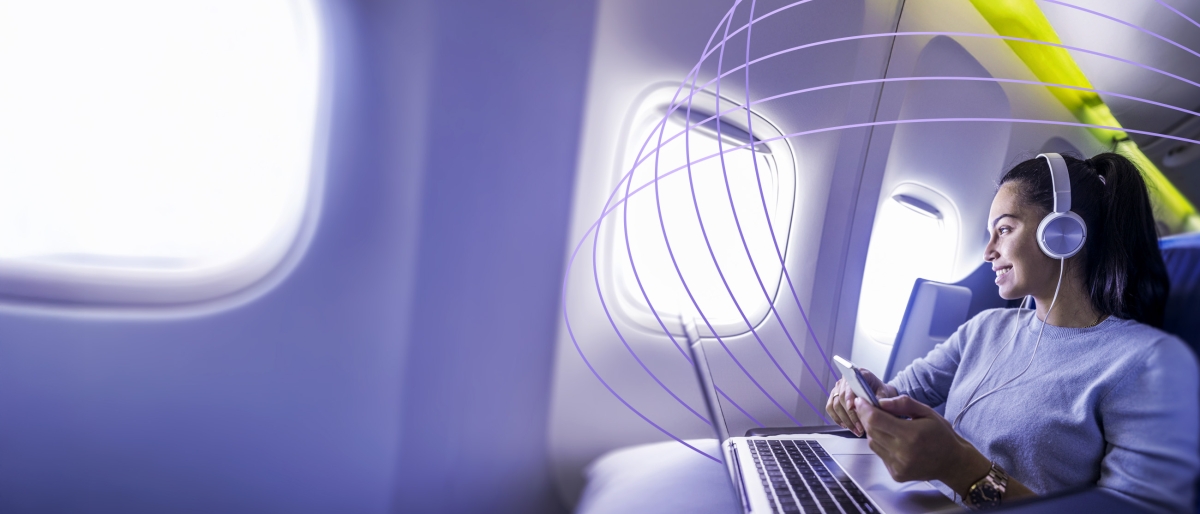 passenger on plane using wi-fi