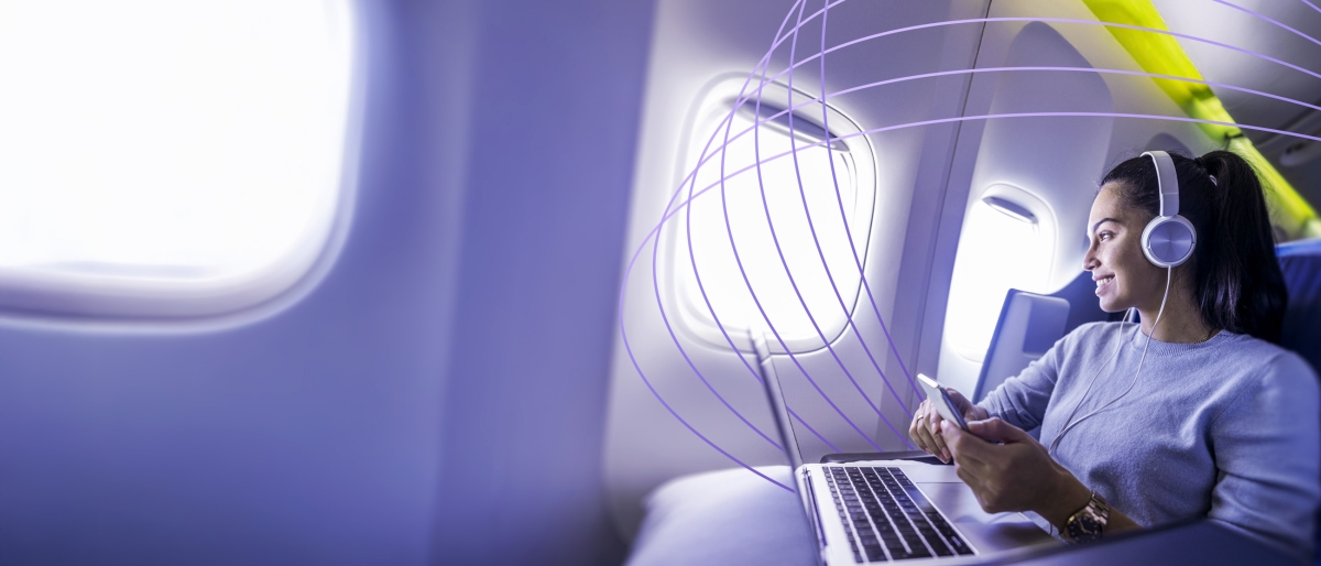 passenger on plane using wi-fi