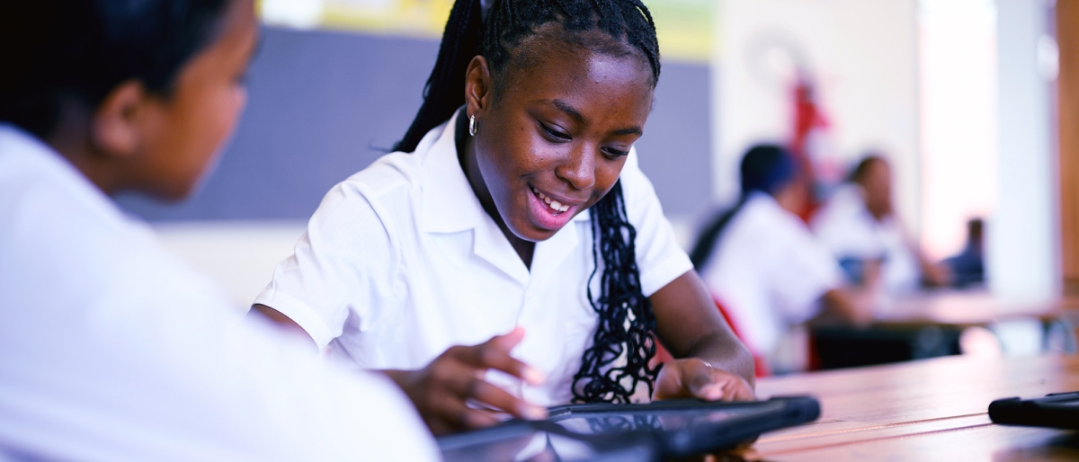 African Schoolgirls working on tablet