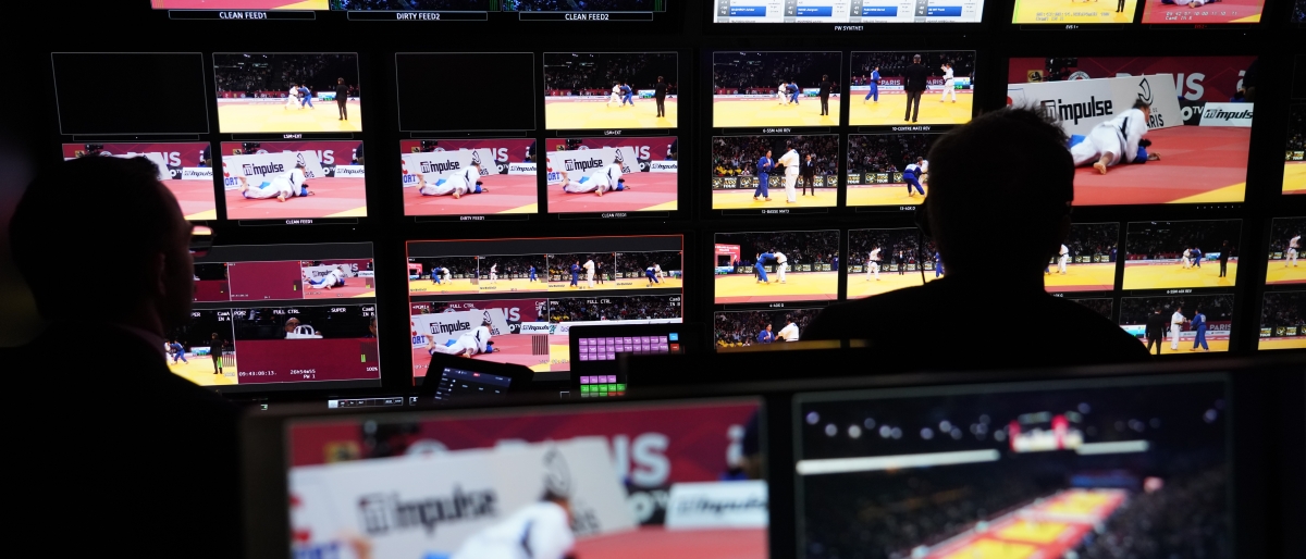 Image of a Broadcast control room monitoring multiple sports live feeds.