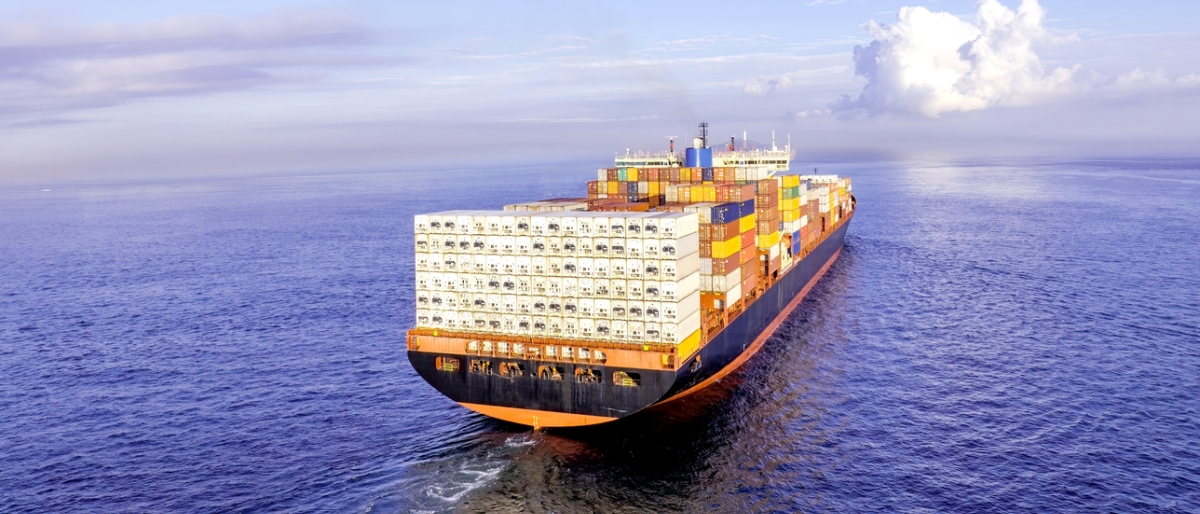 Image of a cargo ship carrying goods on the sea