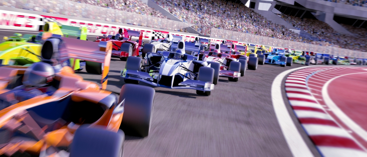 Image of race cars behind one another on track.