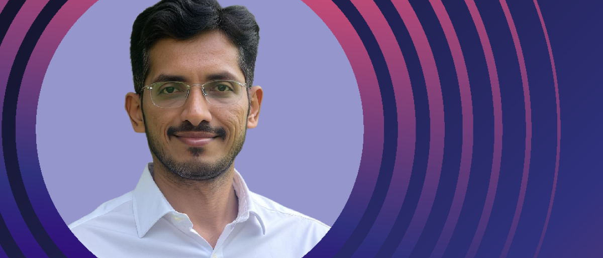 Banner image of Vinod with concentric circles around.