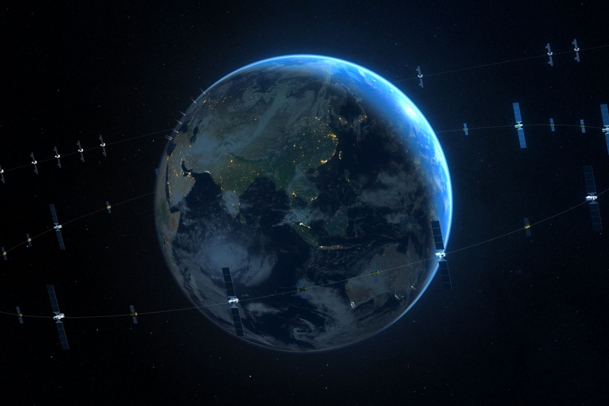 Earth from space with multiple satellites orbiting.