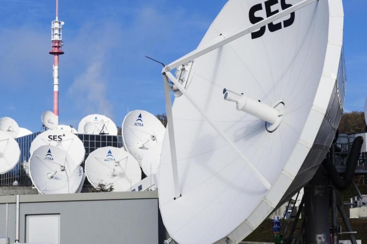 Image of multiple SES antennas mounted on top of buildings.