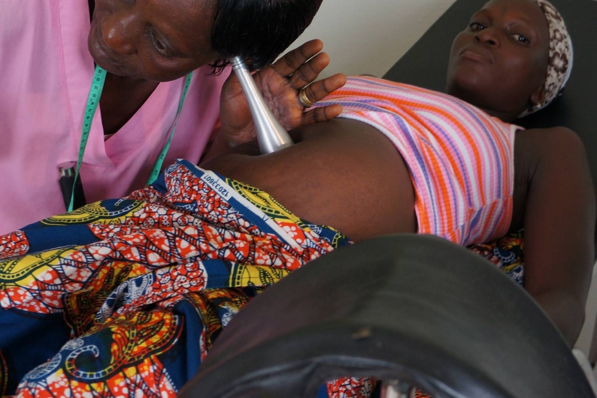 Woman being examined by doctor 