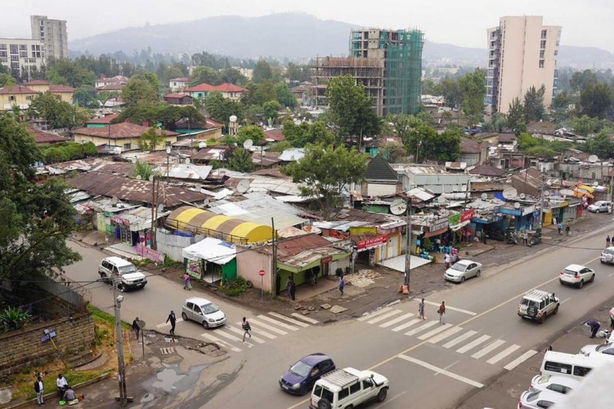 Image of urban neighborhood with busy streets taken from a to angle.
