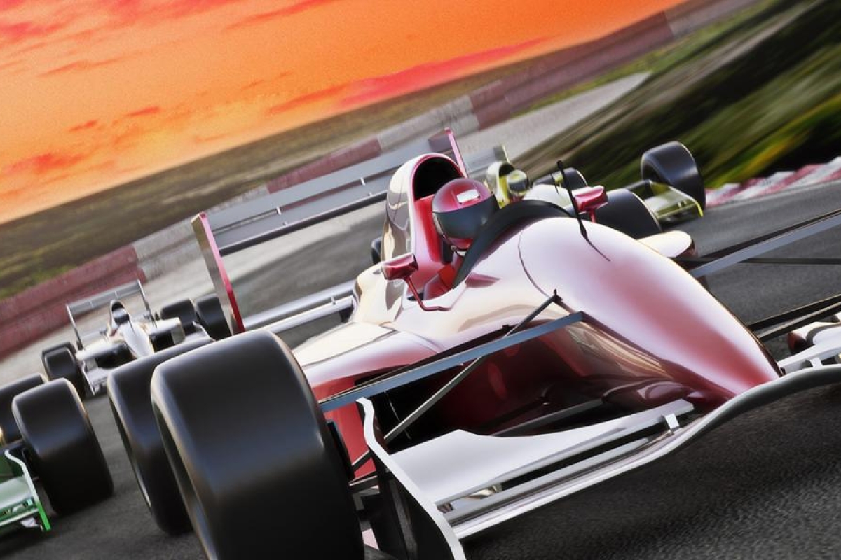 Image of race cars behind one another on track.