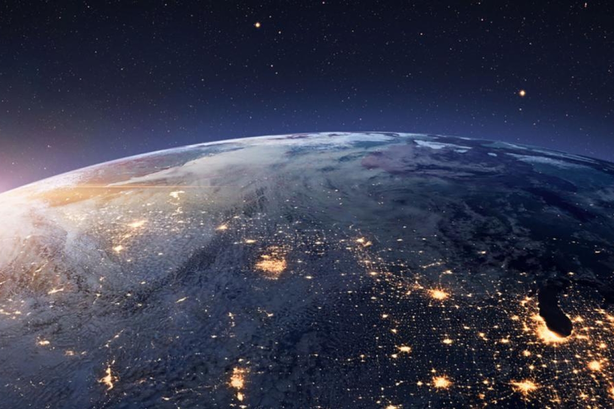 Image of view of Earth from space with city lights visible