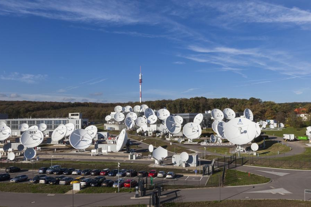 Wide angle image of satellites mounted behind a car parking.