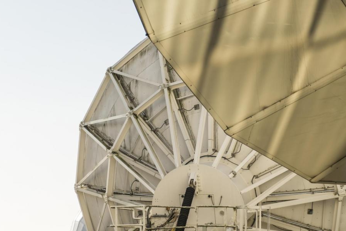 Closeup image of large satellite communication antennas.