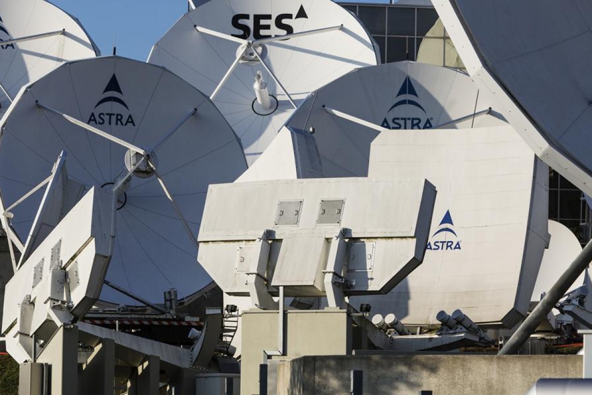 Image of SES and Astra satellite dishes mounted on buildings.