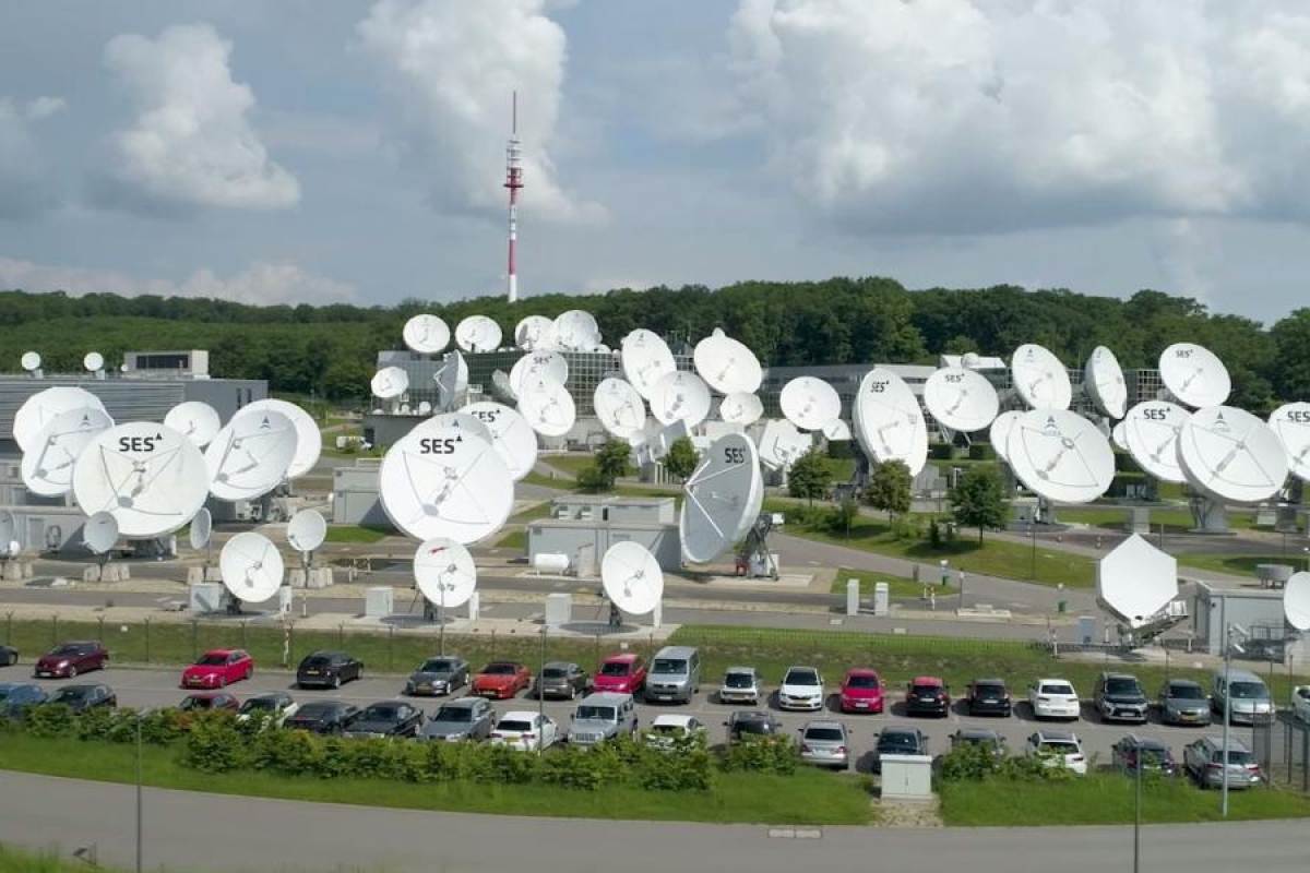 Image of SES and Astra satellite dishes at a communications facility.