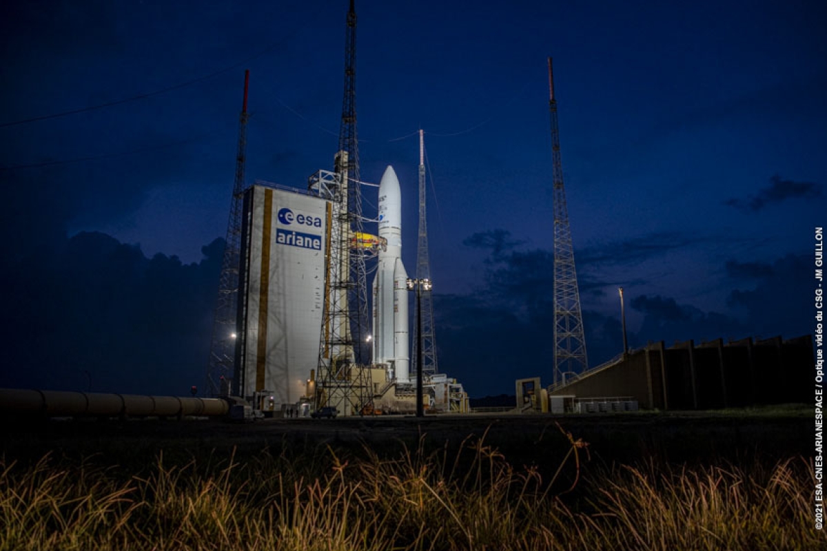 rocket with SES-17 satellites on launchpad at night