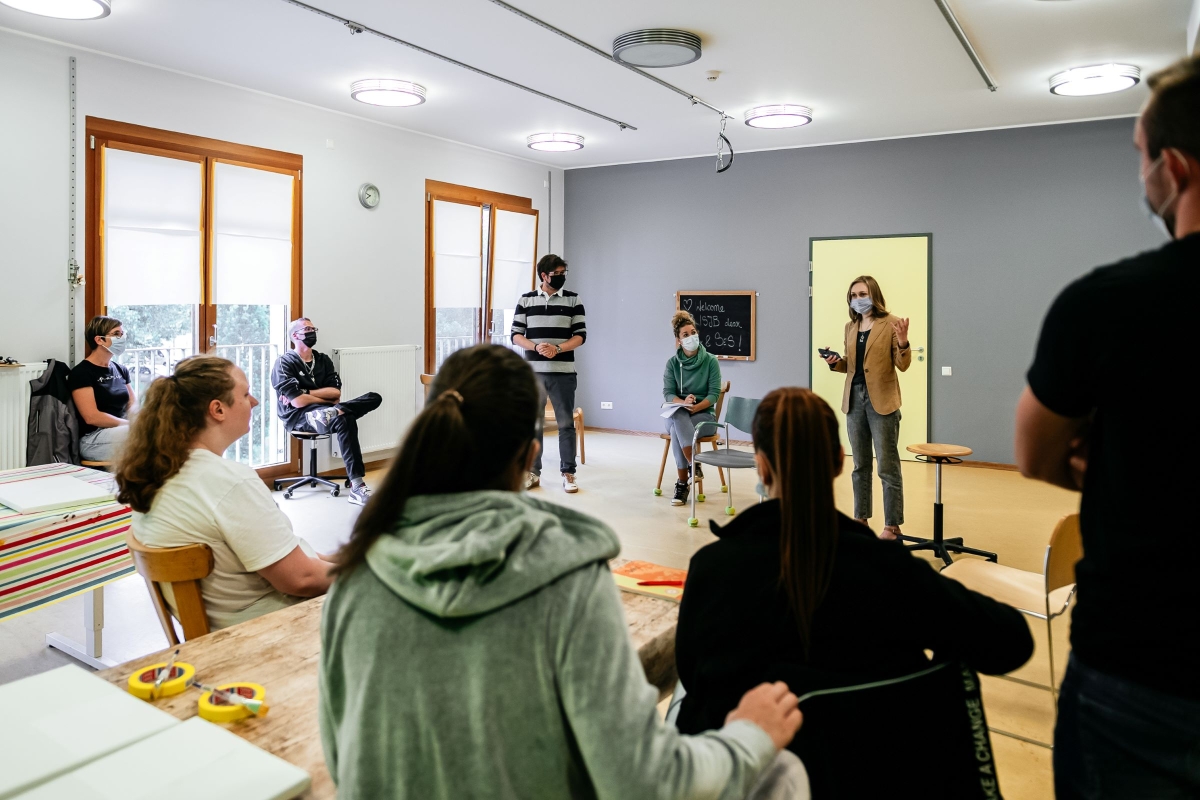 people in room - woman talking