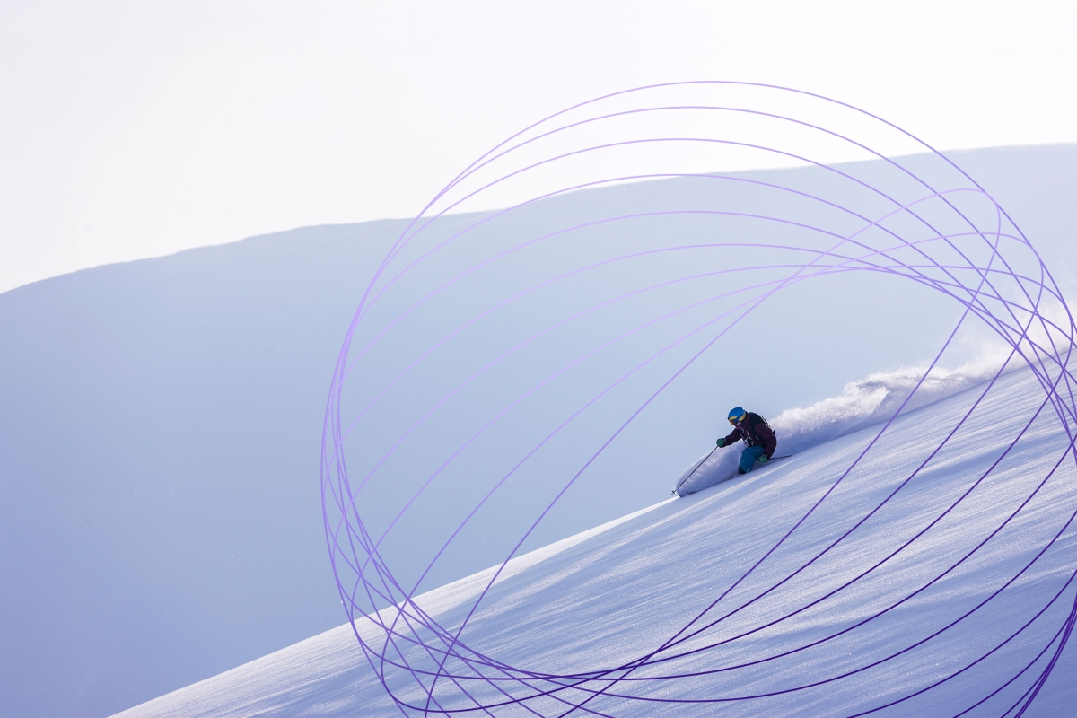 skier turning downhill