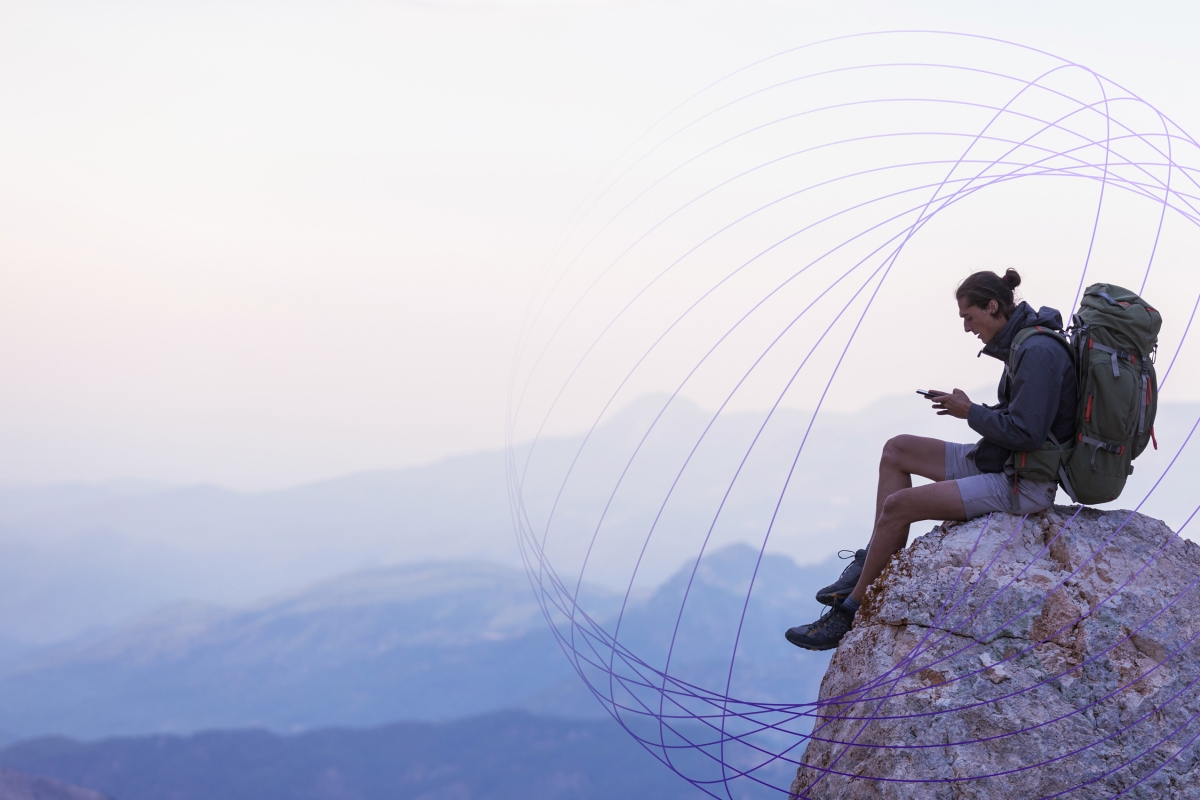 hiker using cell service
