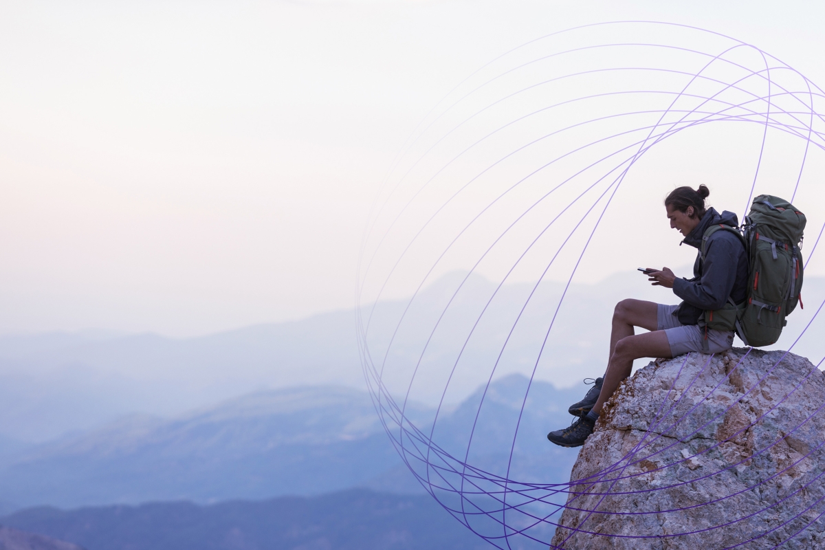 hiker using cell service
