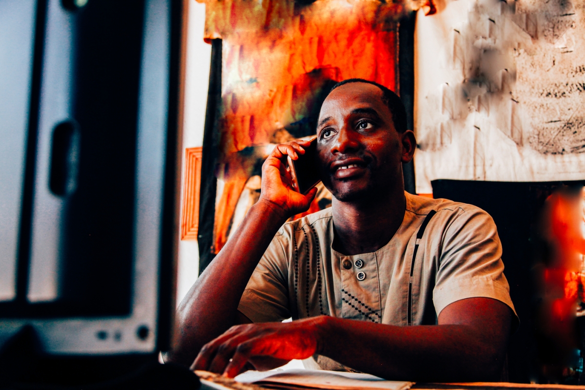 man in Mali using cellphone