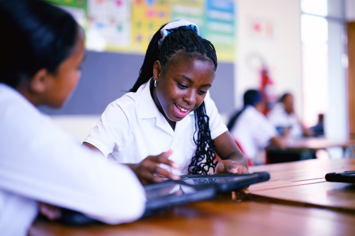 African Schoolgirls working on tablet