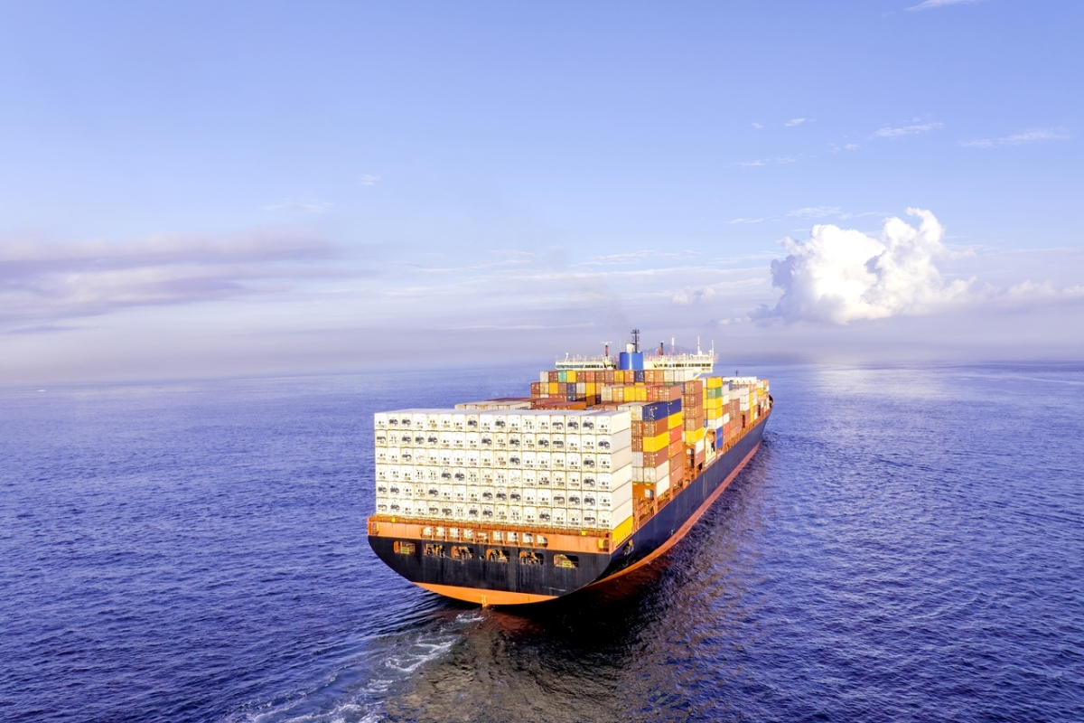 Image of a cargo ship carrying goods on the sea