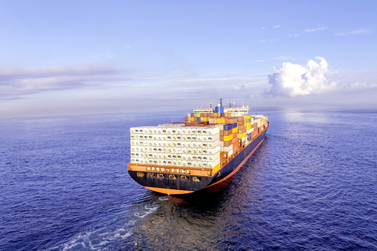 Image of a cargo ship carrying goods on the sea