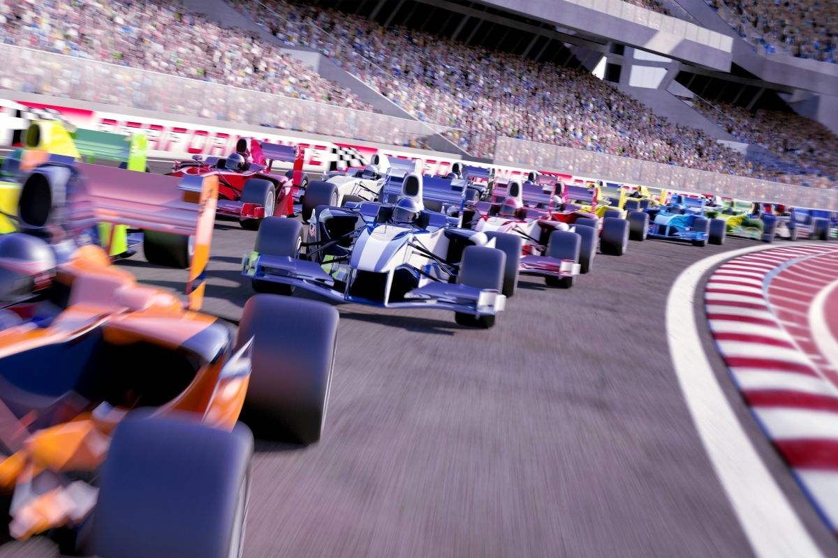 Image of race cars behind one another on track.