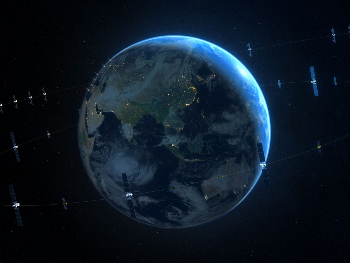 Earth from space with multiple satellites orbiting.