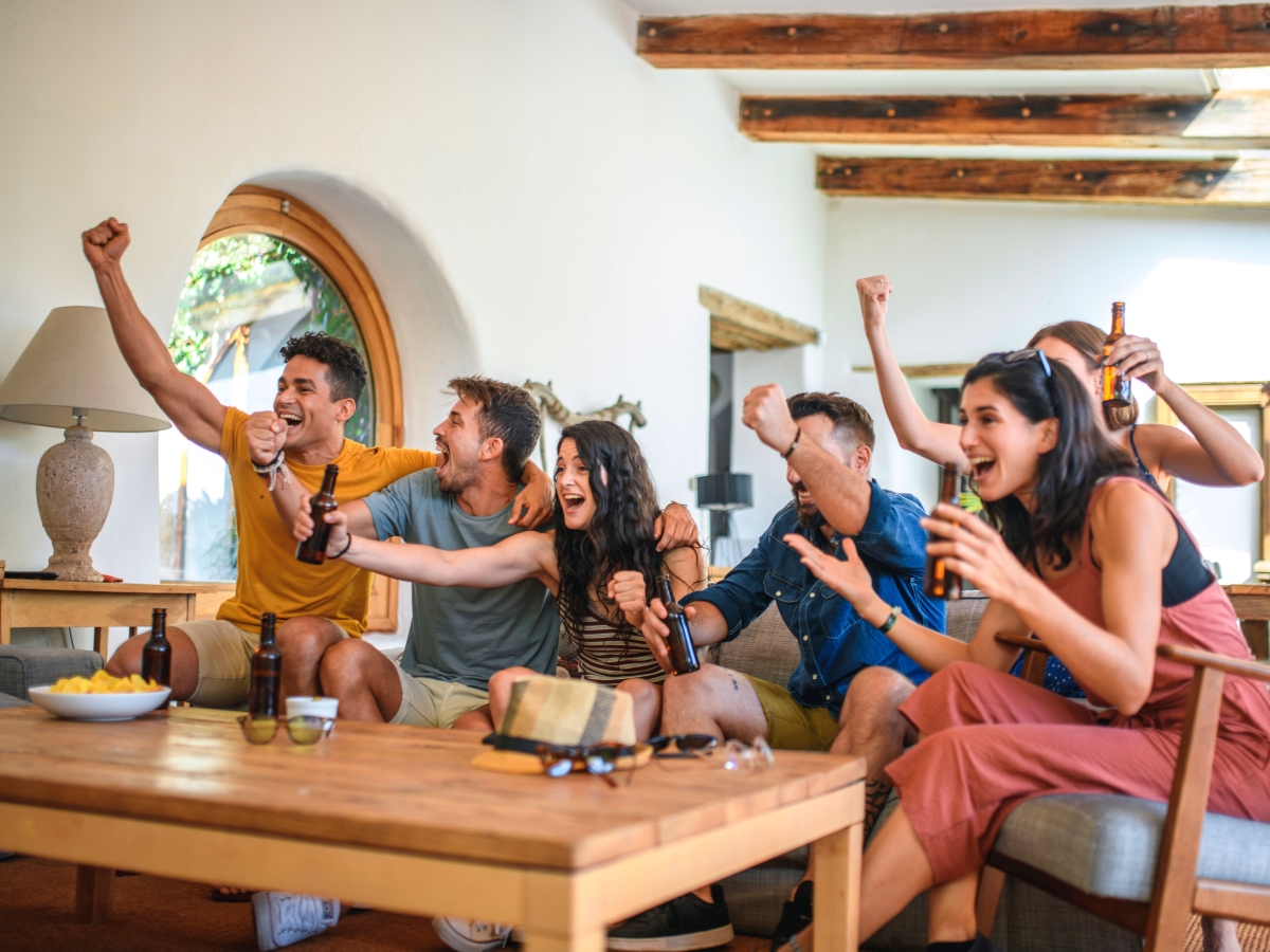 Friends watching sports on tv
