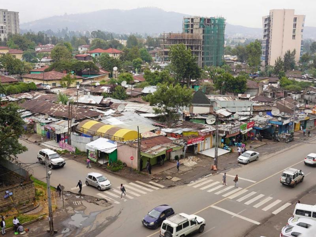 Image of urban neighborhood with busy streets taken from a to angle.