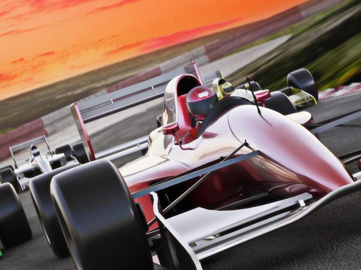 Image of race cars behind one another on track.